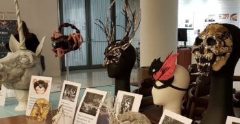 An archive display at a masks themed family event © Royal Opera House